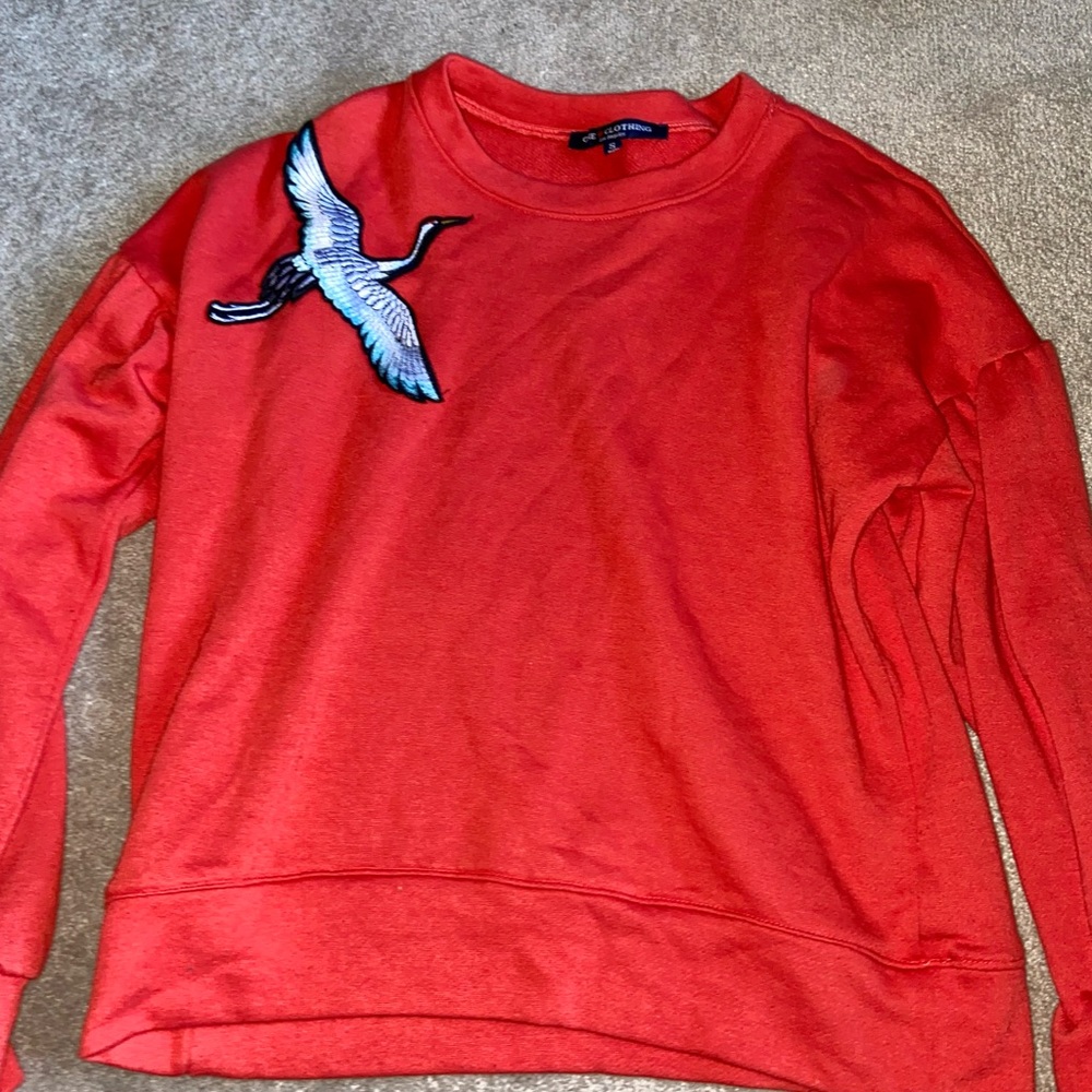 Red crew neck